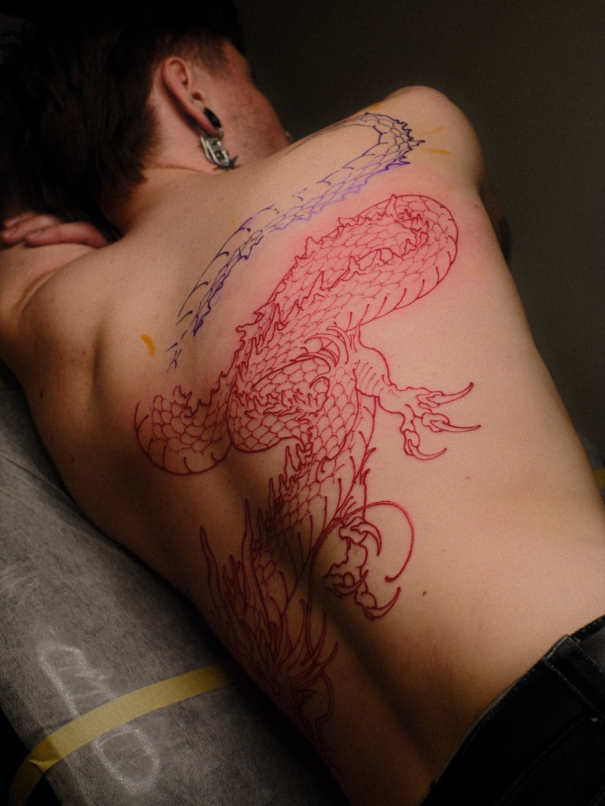 Red dragon linework across the back